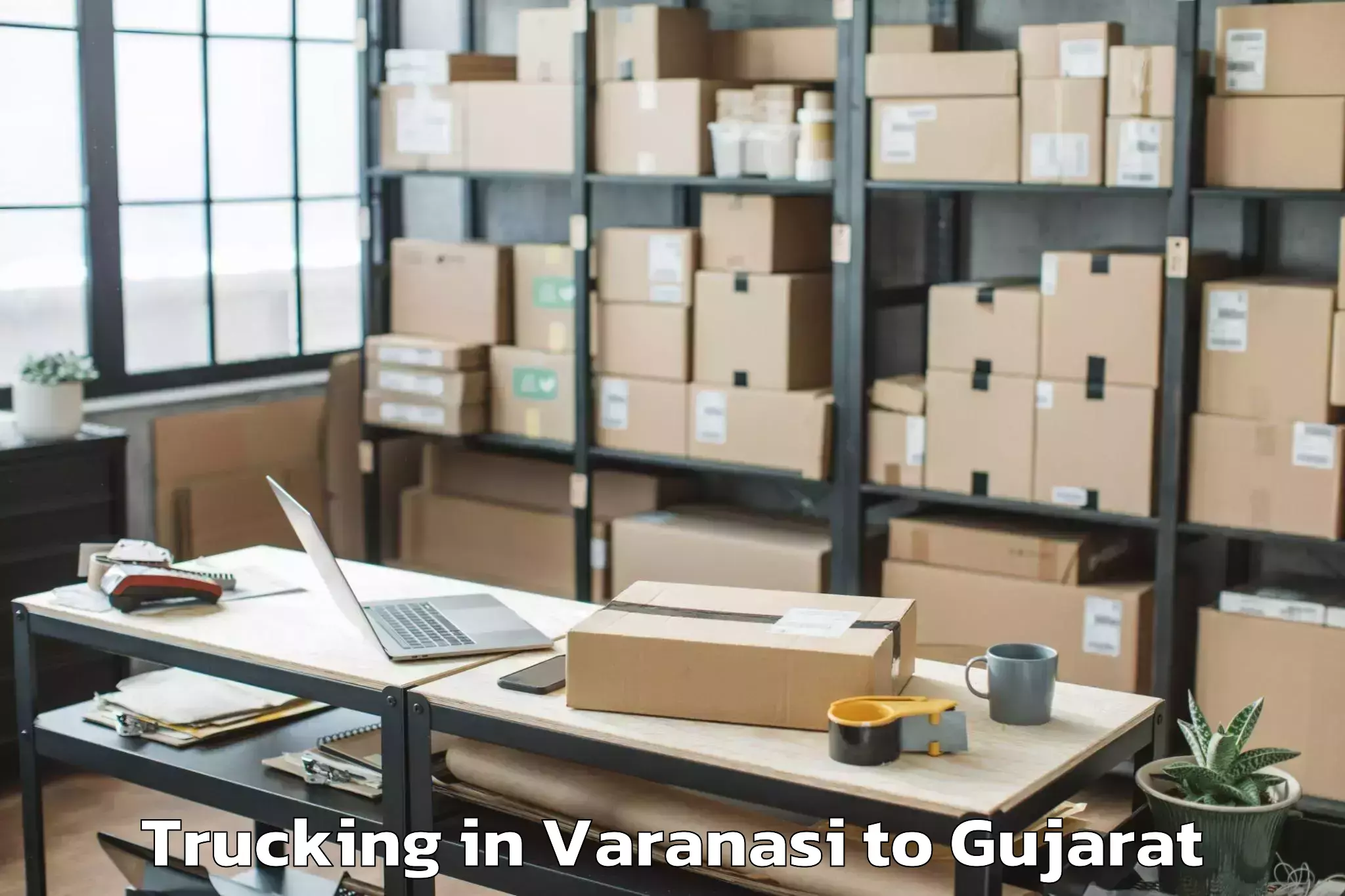 Book Varanasi to Damnagar Trucking